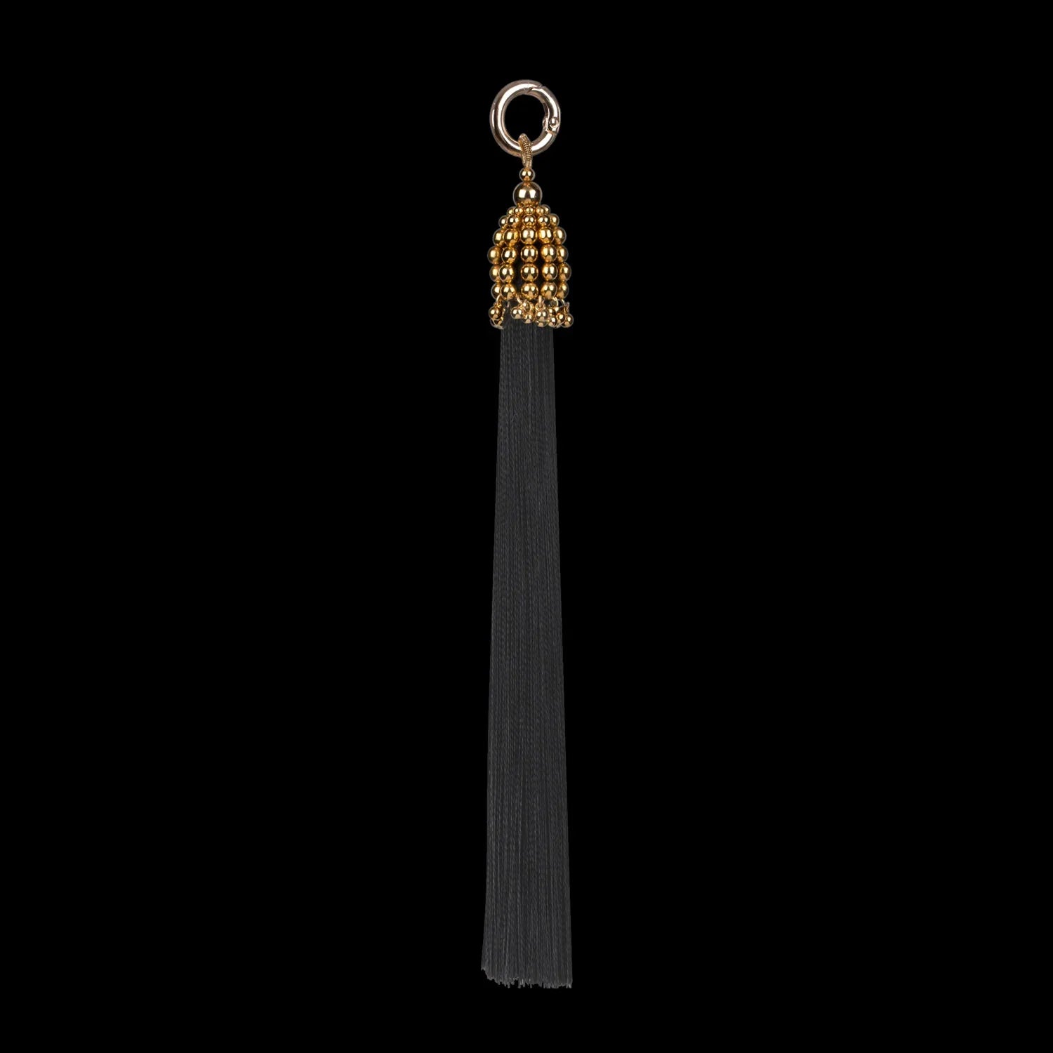 beaded modular polyester tassel in gold cap black threads