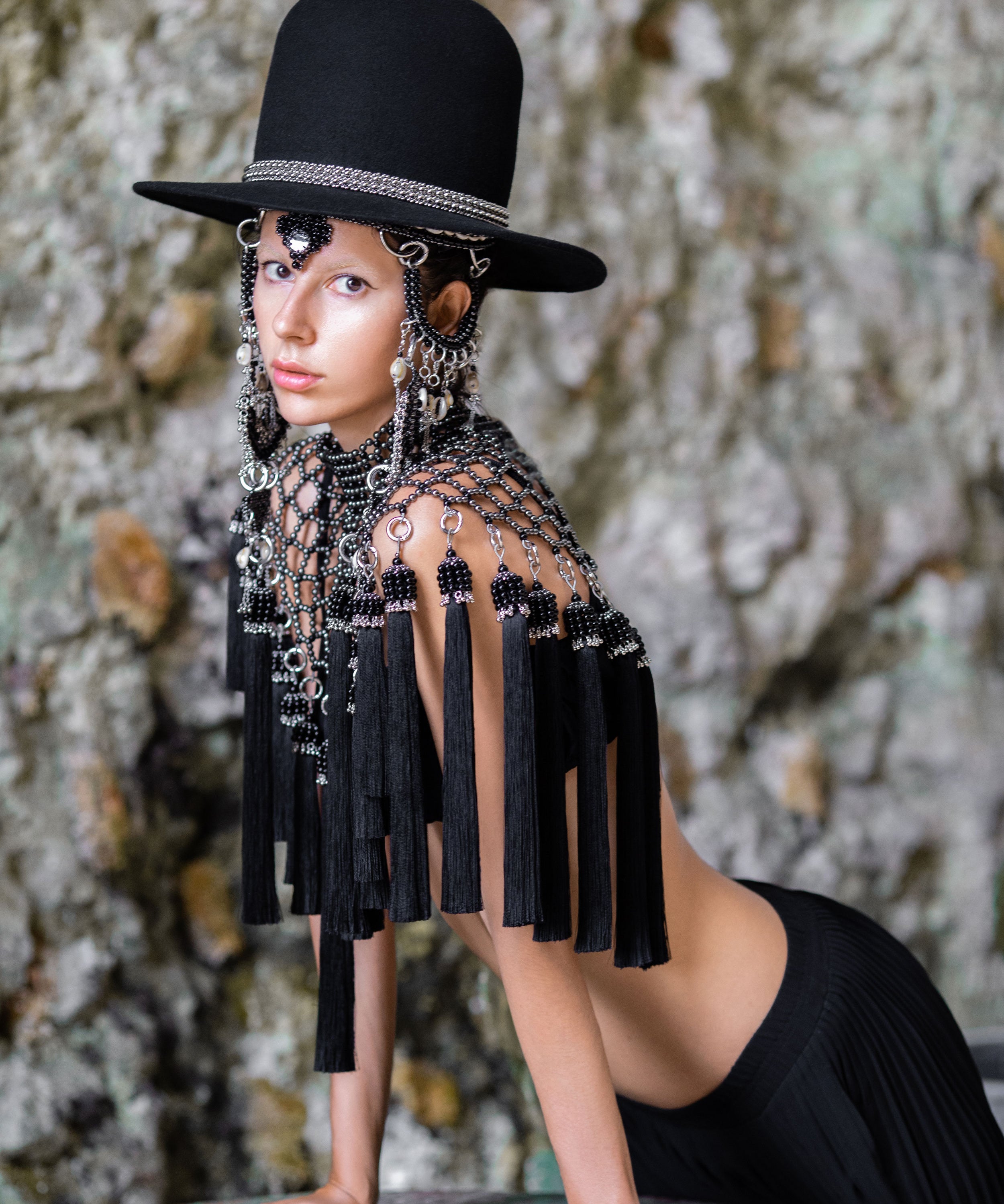 Beaded handcrafted polyester tassel by silver coated metal beads back crystal with freja cape and rushi headpiece on grey background