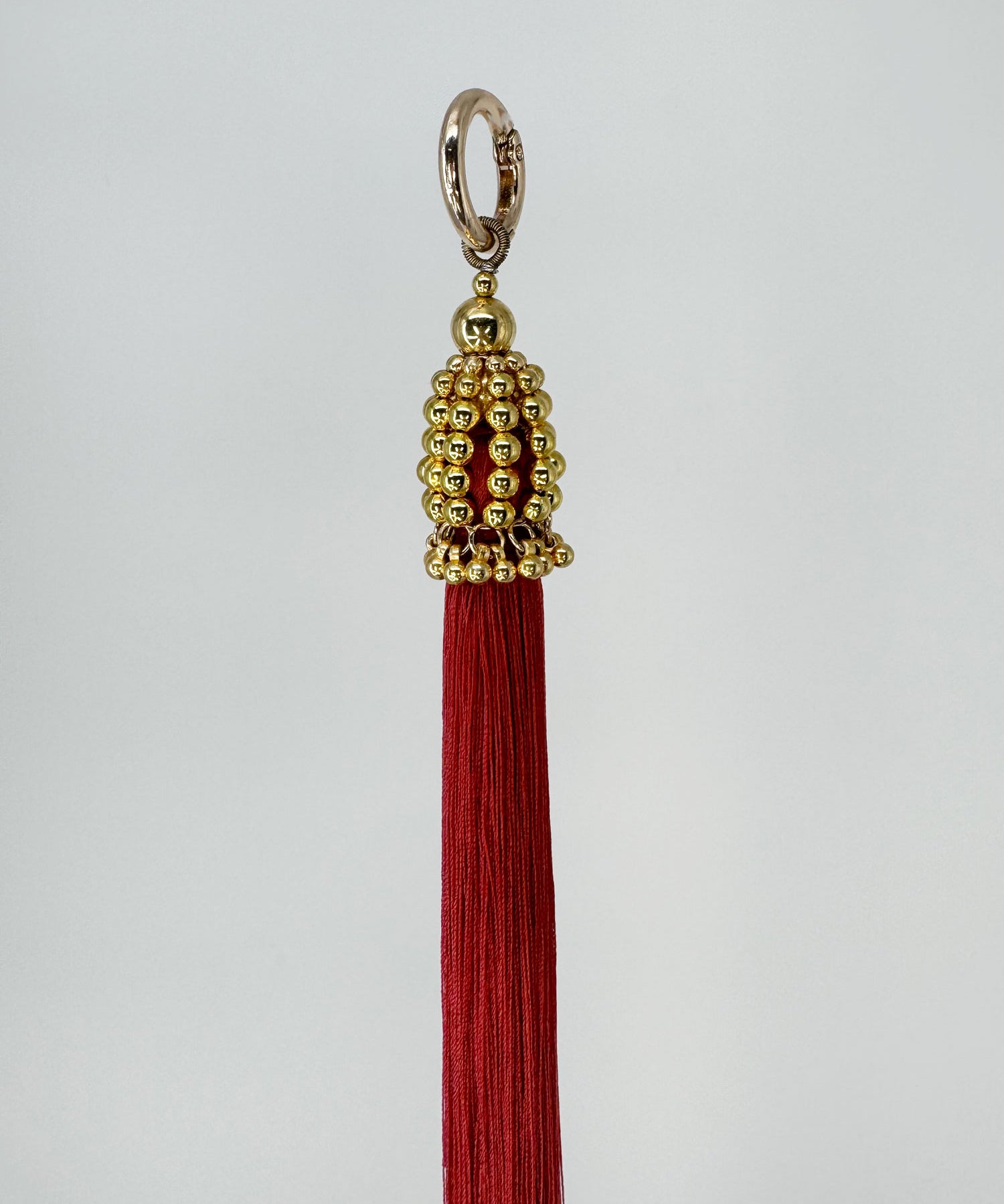 22-gold-cap-burgundy-TASSEL-by-Object-_-Dawn-close-up.jpg