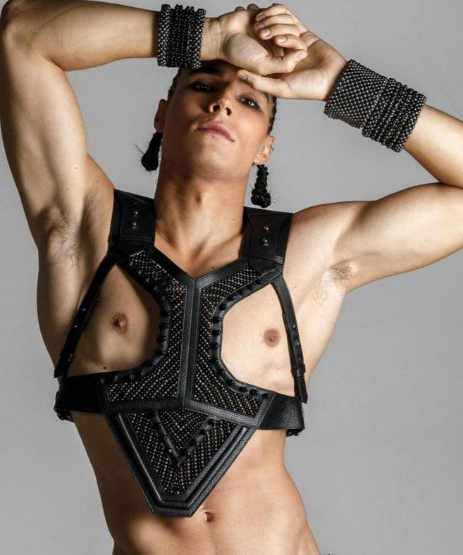 Men wears beaded modular Adonis Men's Leather Harness with khutulun cuff jet black