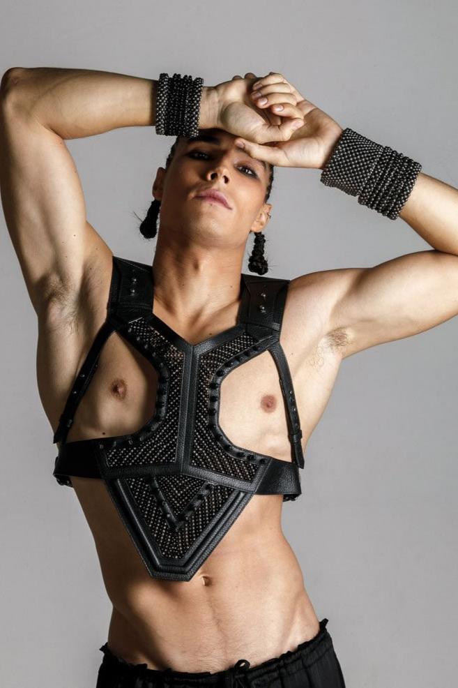 Men wears beaded modular Adonis Men's Leather Harness with khutulun cuff jet black