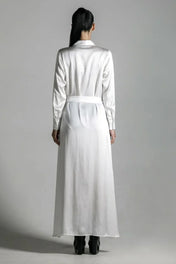 back view of woman wear anais sleeves silk shirt dress white by object & dawn in netural background