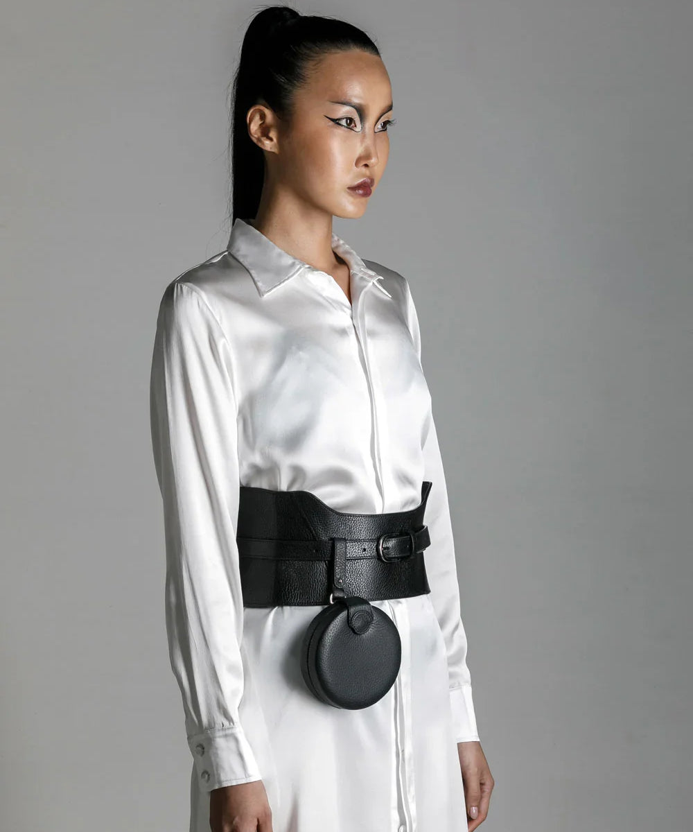 woman wear anais hilk shirt dress with zheng coin bag and corset belt by object and dawn