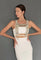 woman in white outfit wear artemisia mesh top in pearl with grey background