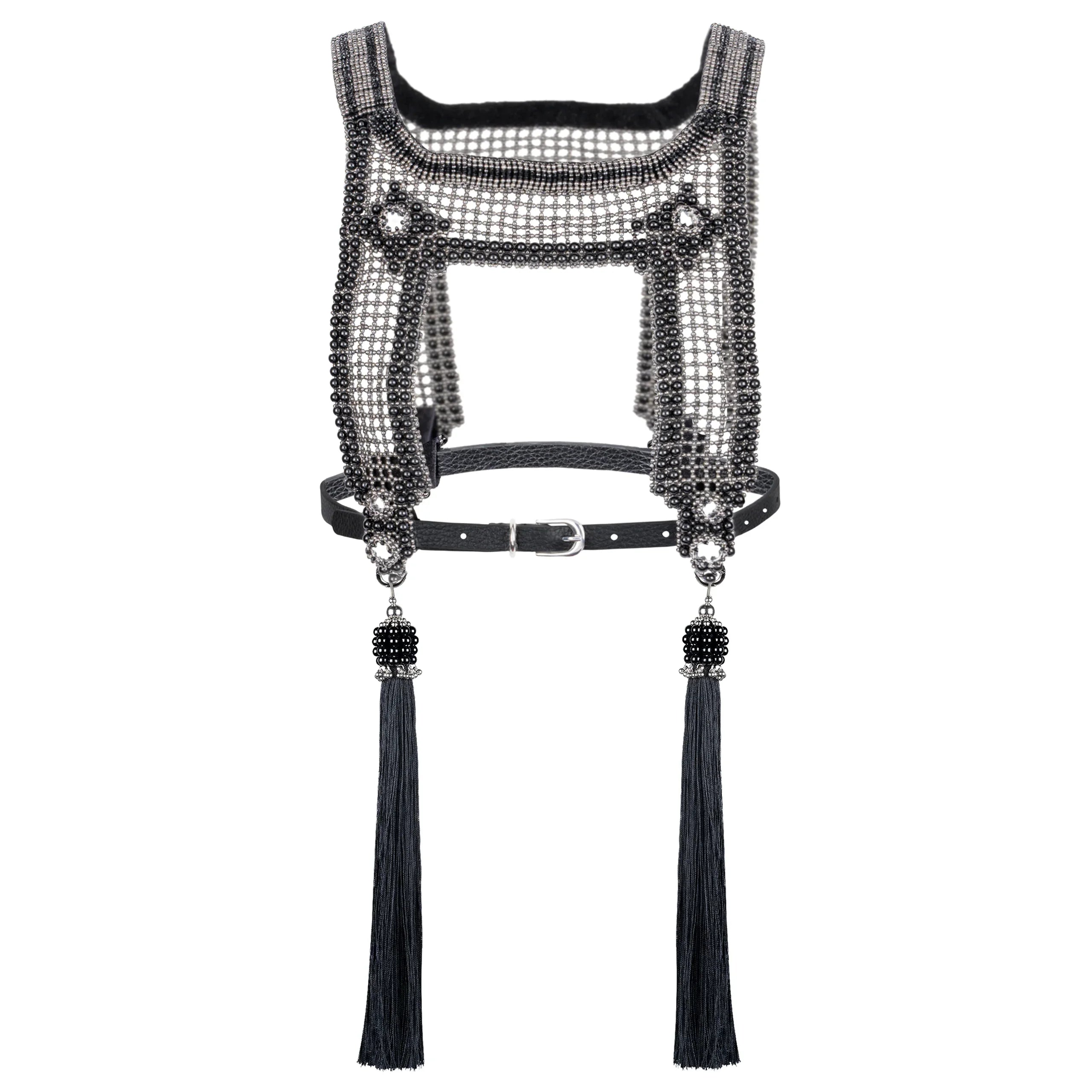 ghost image of Black mesh harness with mirror accents and black thread tassels on a white background