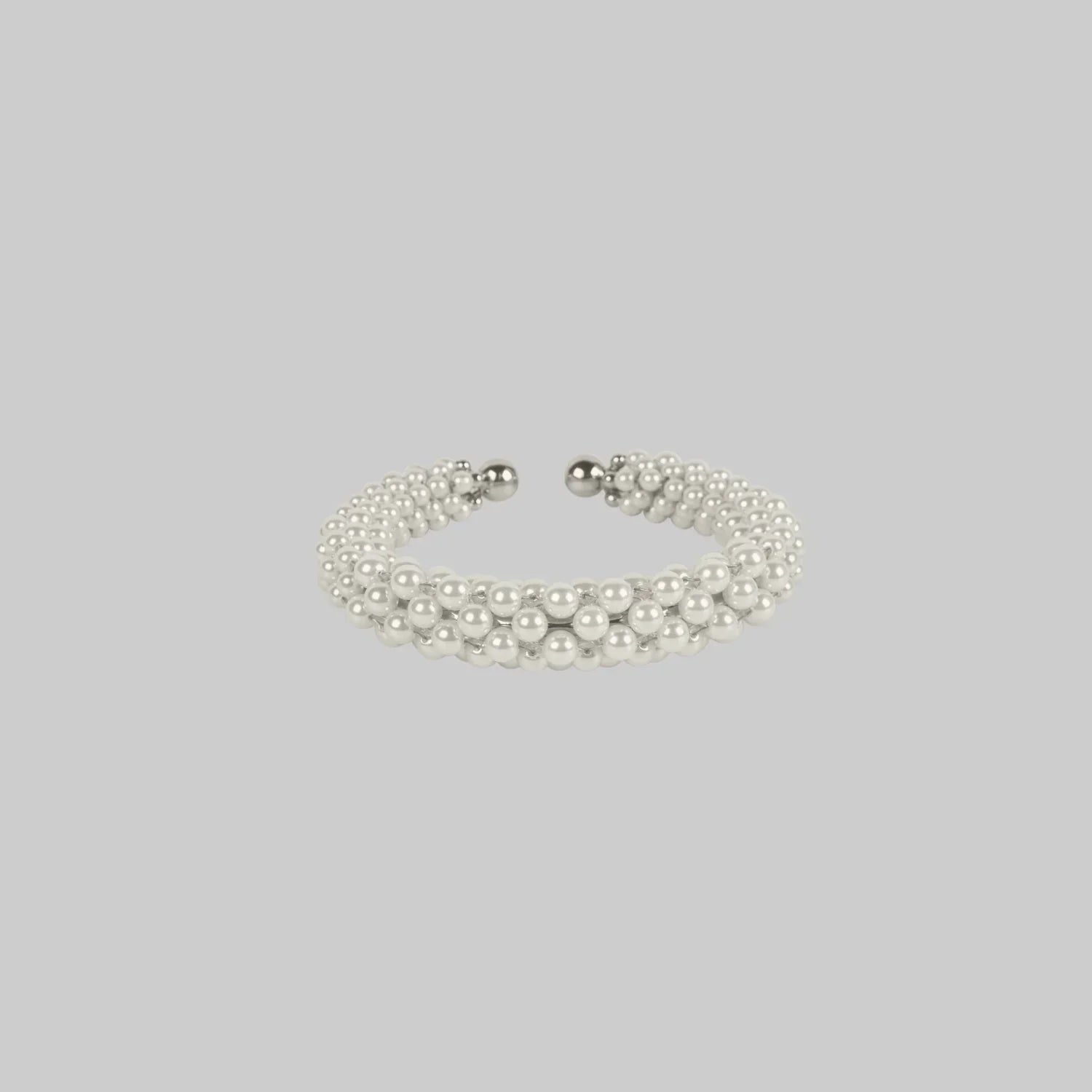 handcrafted modular beaded wrist bracelet with polymer metal beads with silver coated and synthetic
 japanese pearl by object and dawn side view