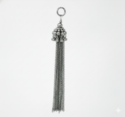 Beaded chain tassels beads in silver color  on a grey background by Object&Dawn
