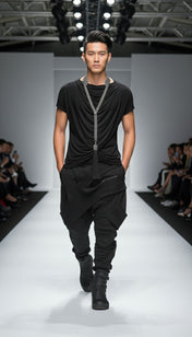 Model walking on a fashion show runway wearing a black outfit with Beaded Tailored Collar Silver  with tassel by Object & Dawn 