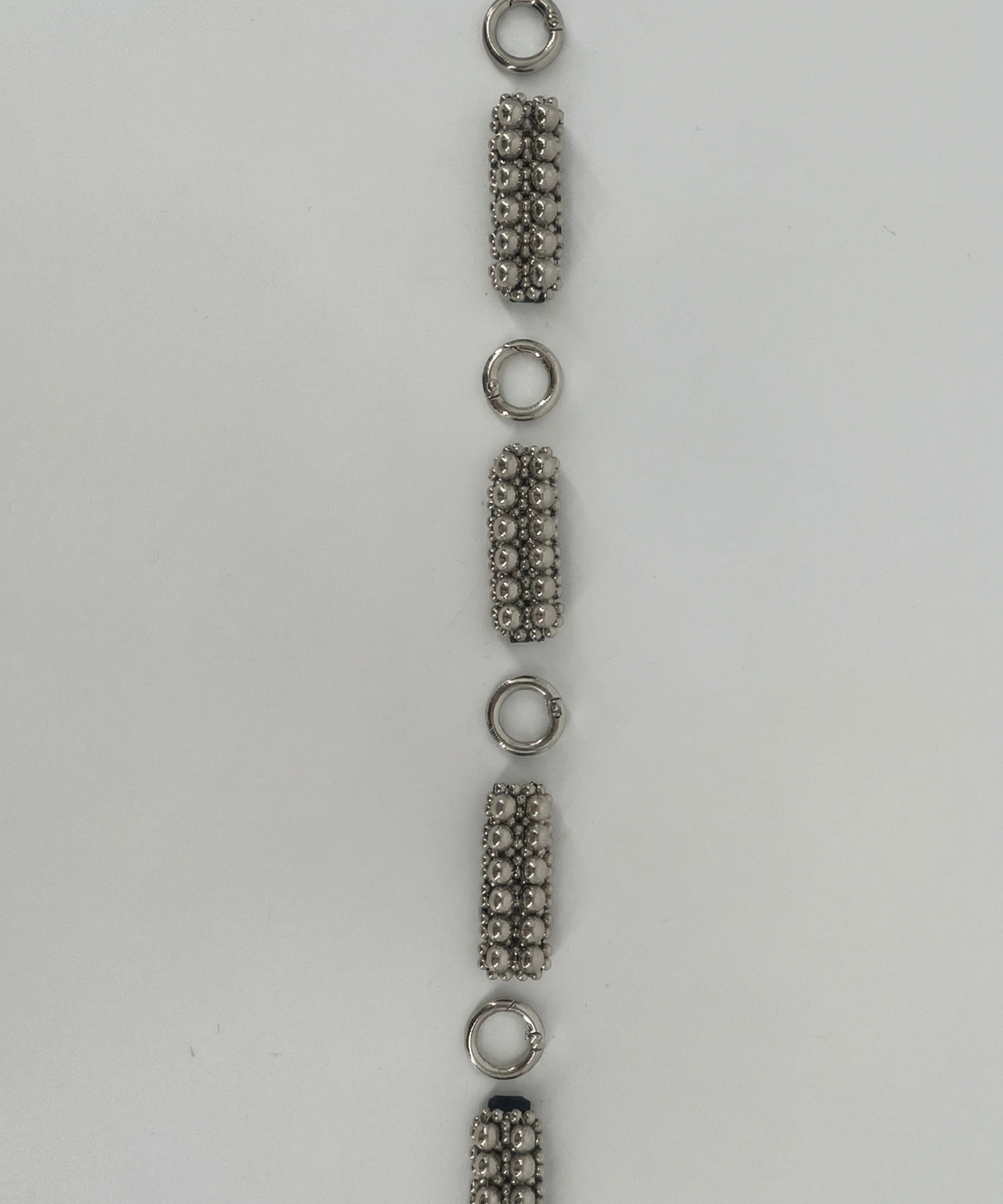 Object & Dawn headband featuring silver intricate beaded links with unconected claps craftsmanship