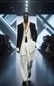 Model walking on a fashion show runway wearing a black and white outfit with sunglasses, and Beaded Necklace gold by Object & Dawn.