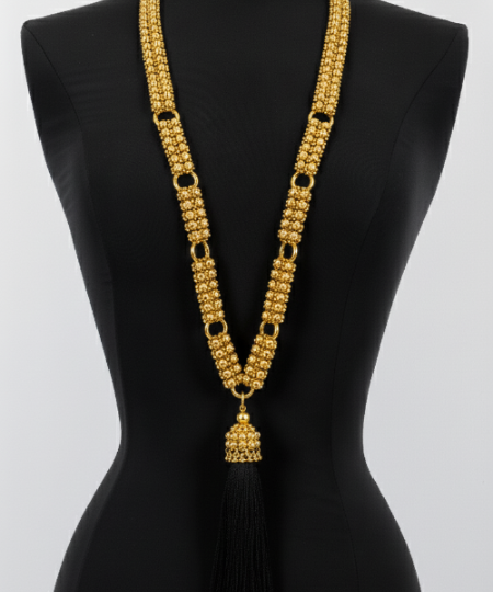 Beaded Link Neklace By Object & Dawn on a black mannequin against a white background