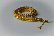 Handmade beaded polymer metal beads with 22k gold wash by object and dawn close up