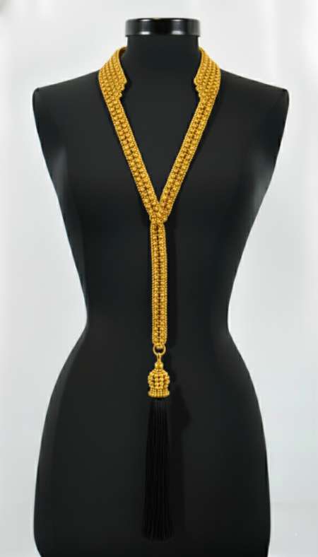 Beaded Tailored Collar Gold  with tassel by Object & Dawn on a black mannequin against a white background