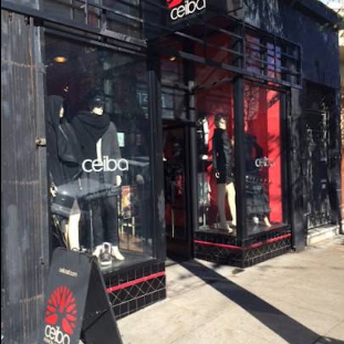 Ceiba store front with glass display cases and a sign on a sidewalk by Object & Dawn.