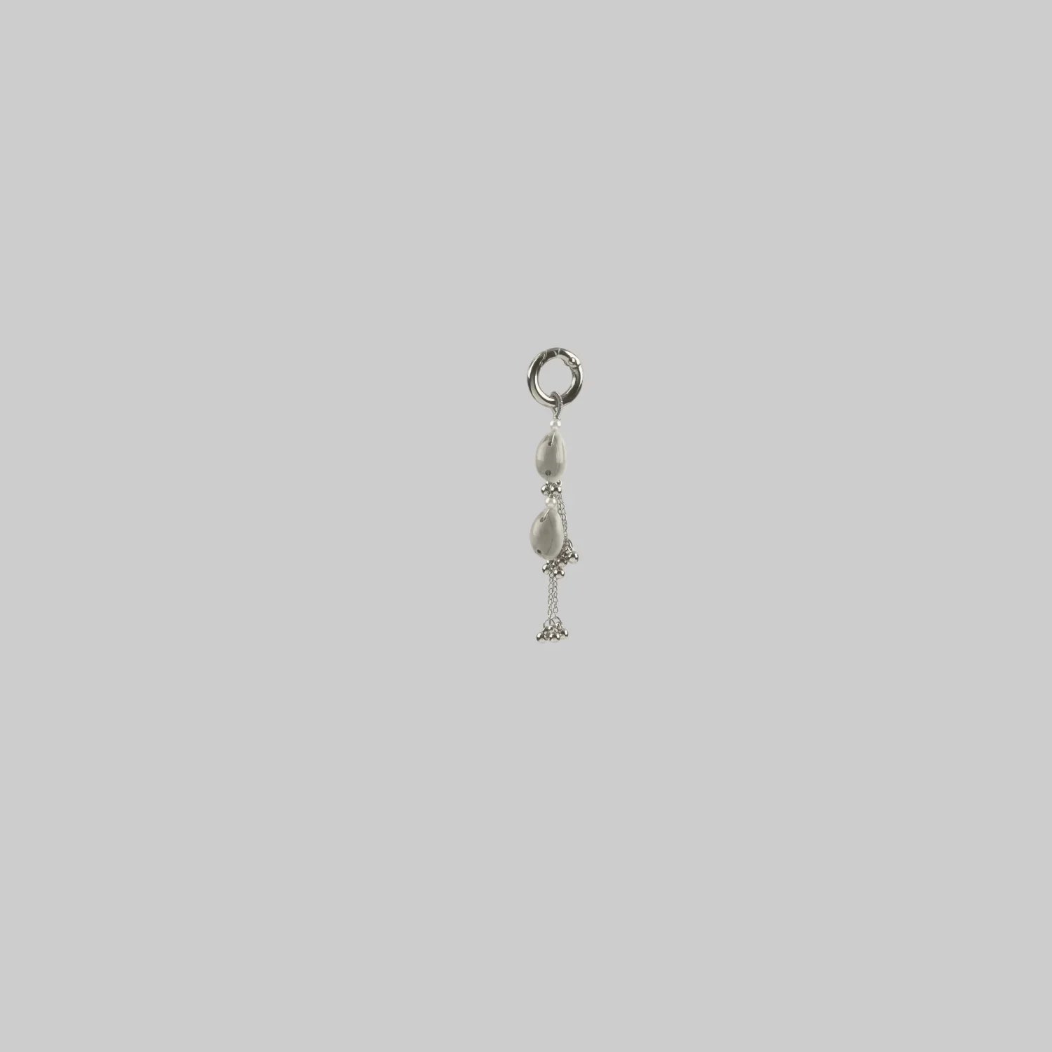 Object and Dawn Modular Beaded attachment for Jas Headpiece System with polymer metal beads and synthetic japanese pearl in grey background