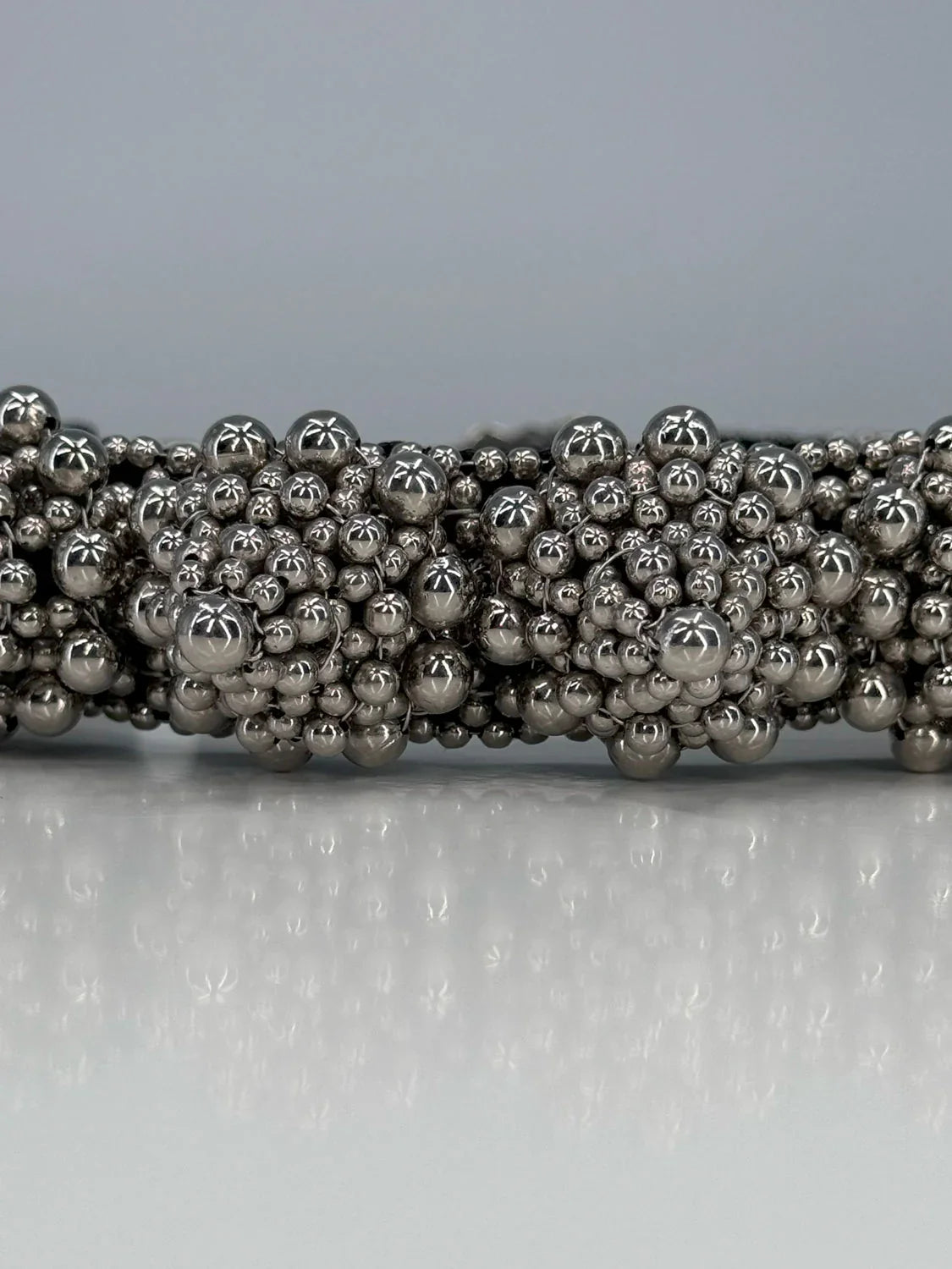 close up of handcrafted eingana hatband in silver by object & dawn 