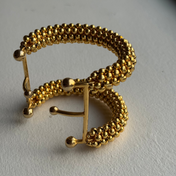 Hera Beaded Cuff Gold by Object & Dawn on a white backgorund front view, ghost image