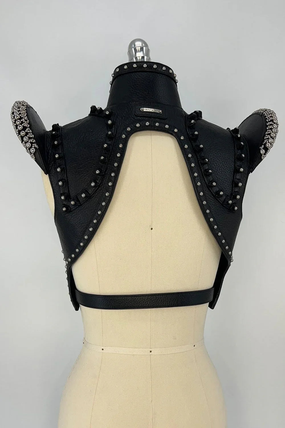 beaded premium leather helios bolero jacket by object and dawn in grey background back view