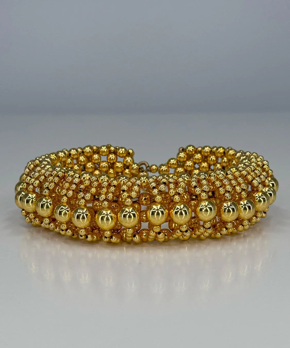 ghost image optical 3d choker in 22k gold wash by object & dawn in white background
