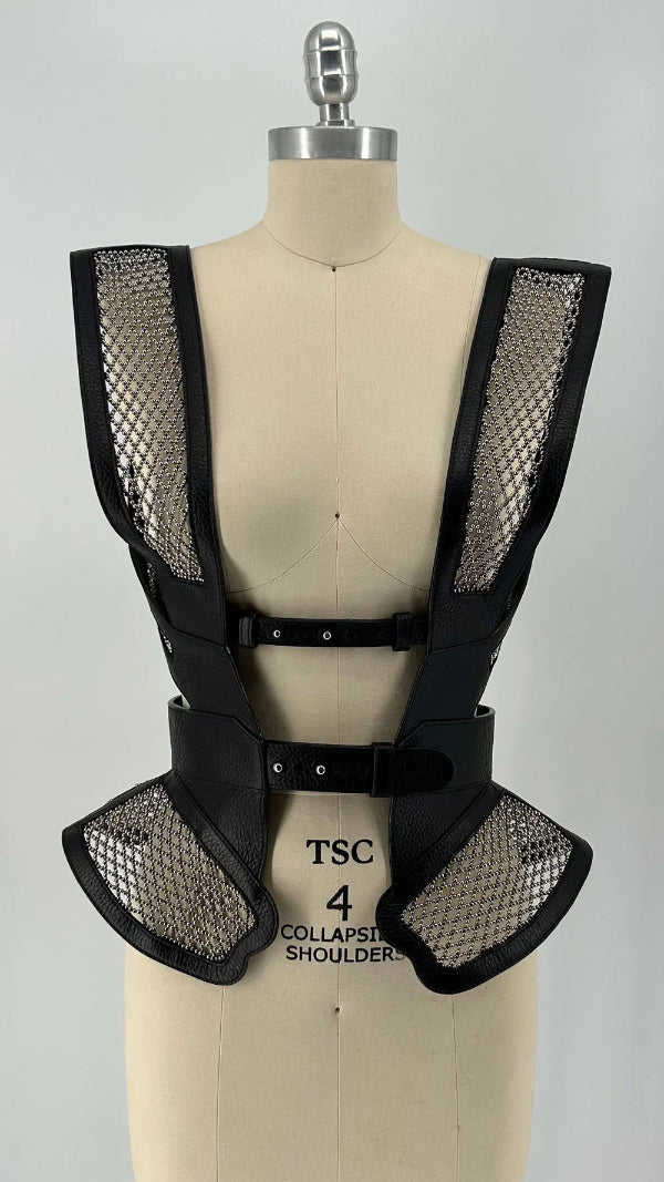 Black beaded mesh and leather top on a mannequin