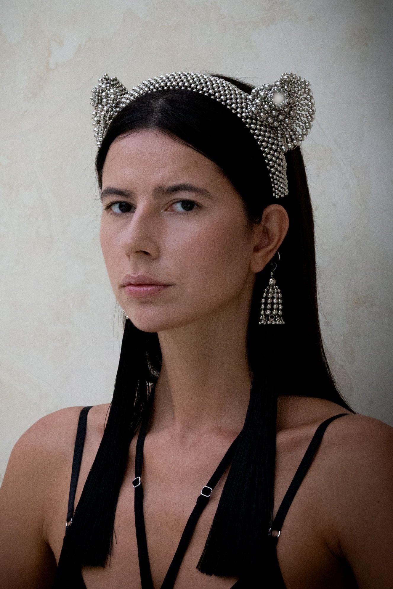 jas headband in silver by Object & Dawn worn by woman in black outfit