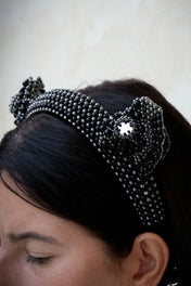 textured view of Jet black beaded Jas headband worn by a person with a neutral background by Object & Dawn