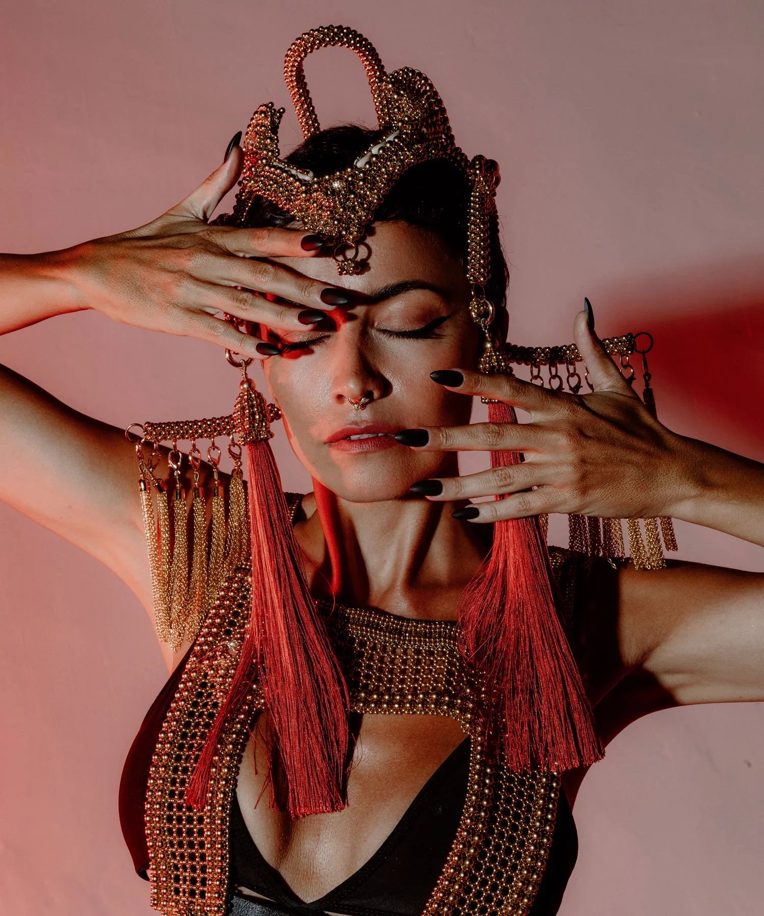 woman with handcrafted modular headpiece system and beaded mesh top by object and dawn