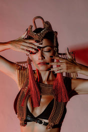 woman with handcrafted modular headpiece system and beaded mesh top by object and dawn