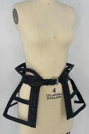 premium leather jas leather cage skirt black on mannequin in white background
