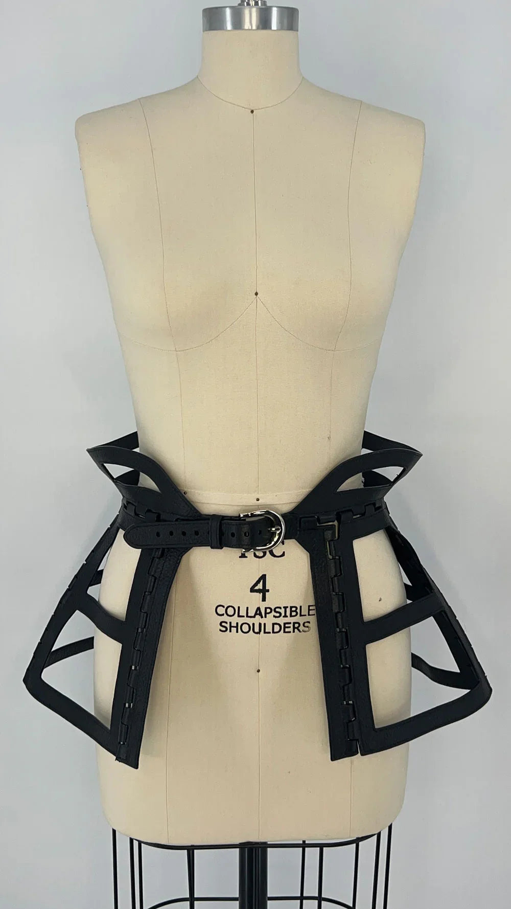 luxury leather jas leather cage skirt in black by object and dawn front view