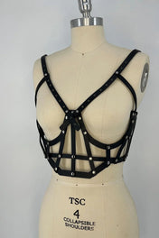 beaded premium leather Jas Studded Cage top by object and dawn on mannequin in white background diagonal front view