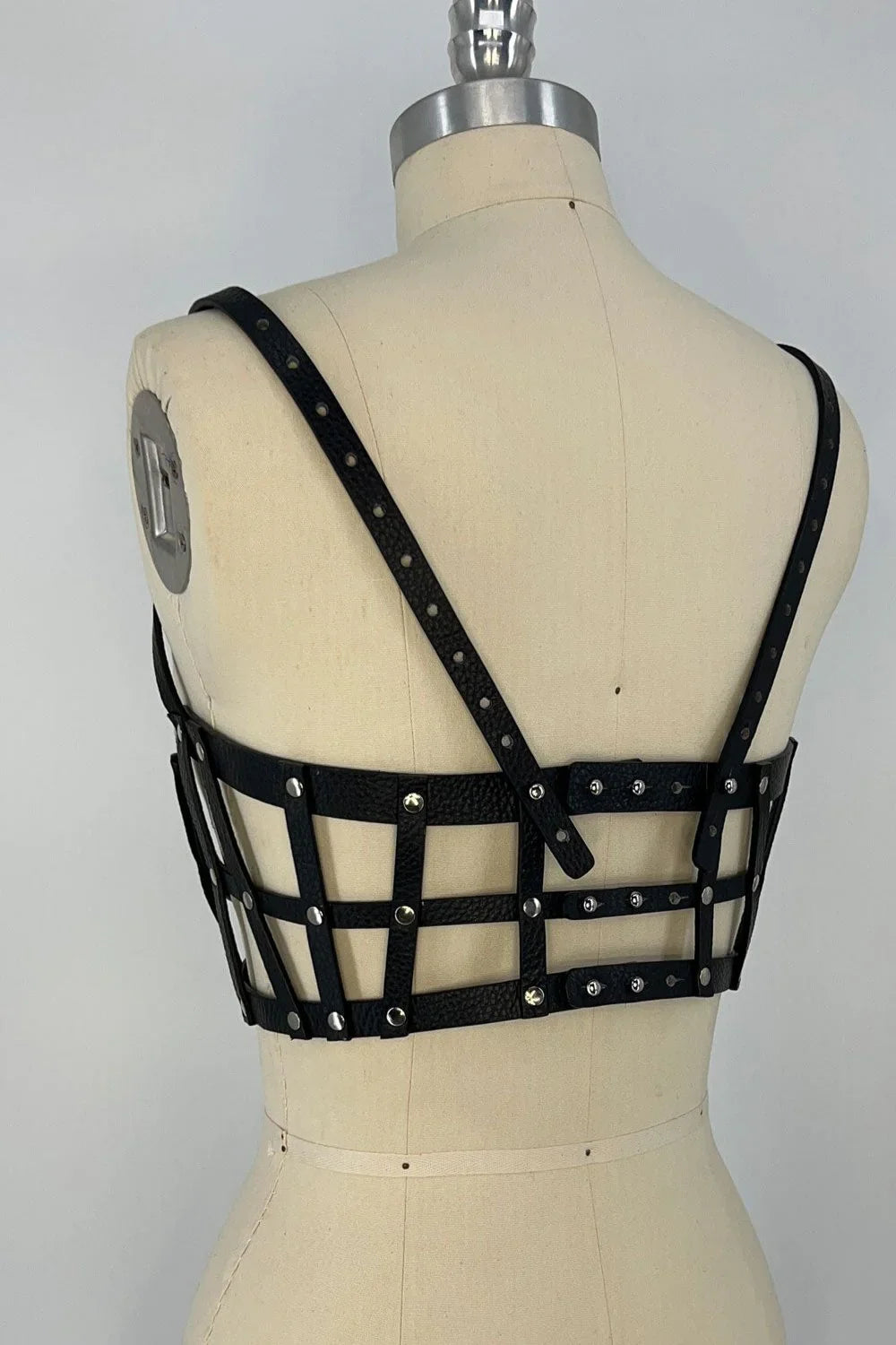 beaded premium leather Jas Studded Cage top by object and dawn on mannequin in white background back view
