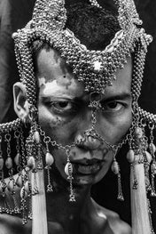 Object and Dawn, modular headpiece system in pearl with removable mask and pearl cowrie tassels close up on person