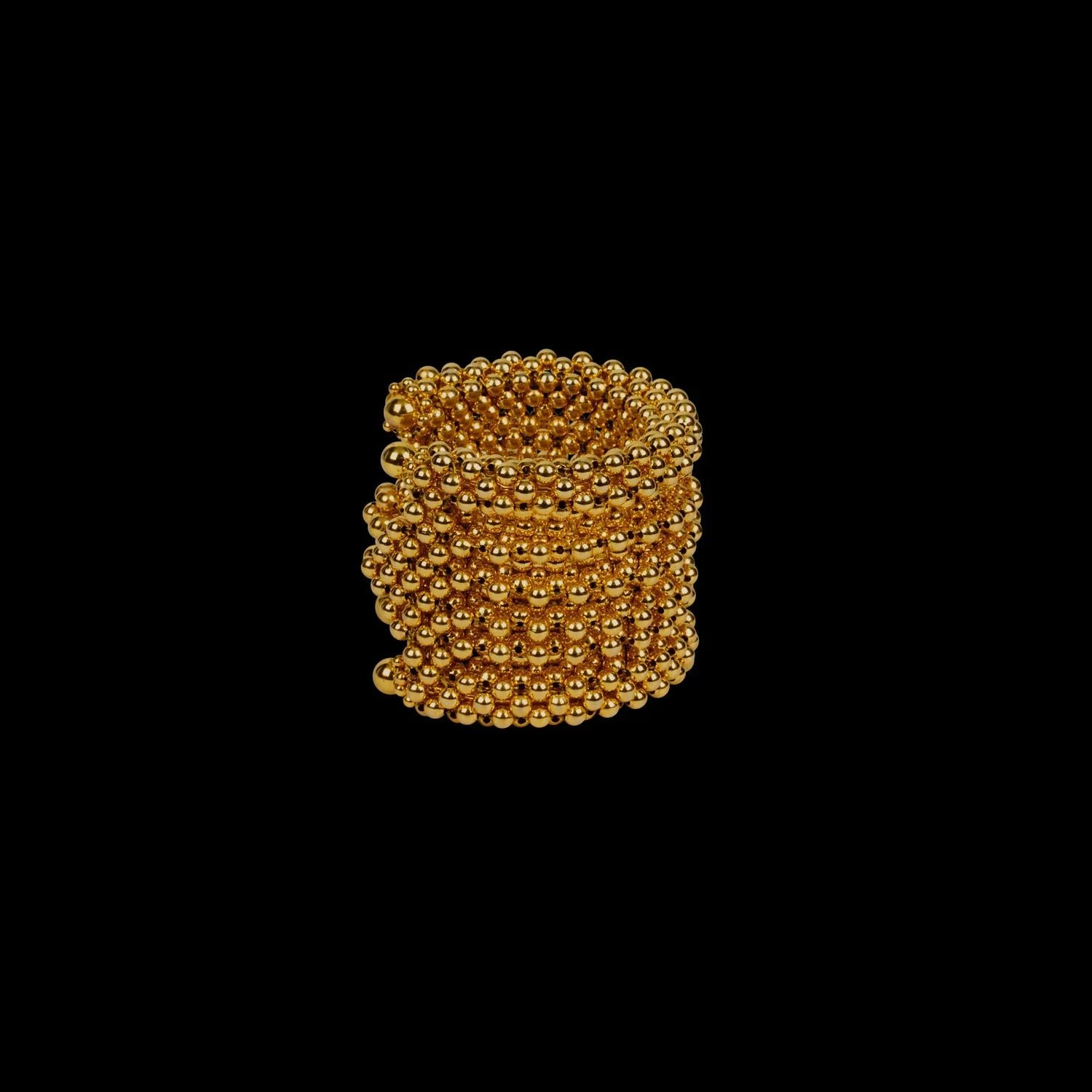 beaded modular 22k gold wash on polymer siler metal beads ghost image side view on black background
