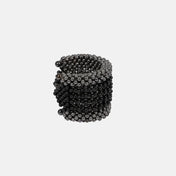 polymer metal beads grey with black crystal Khutulun 4D Supple Cuff from object and dawn side view ghost image