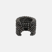 handcrafted polymer metal beads grey Khutulun 4D Supple Cuff from object and dawn front view ghost image