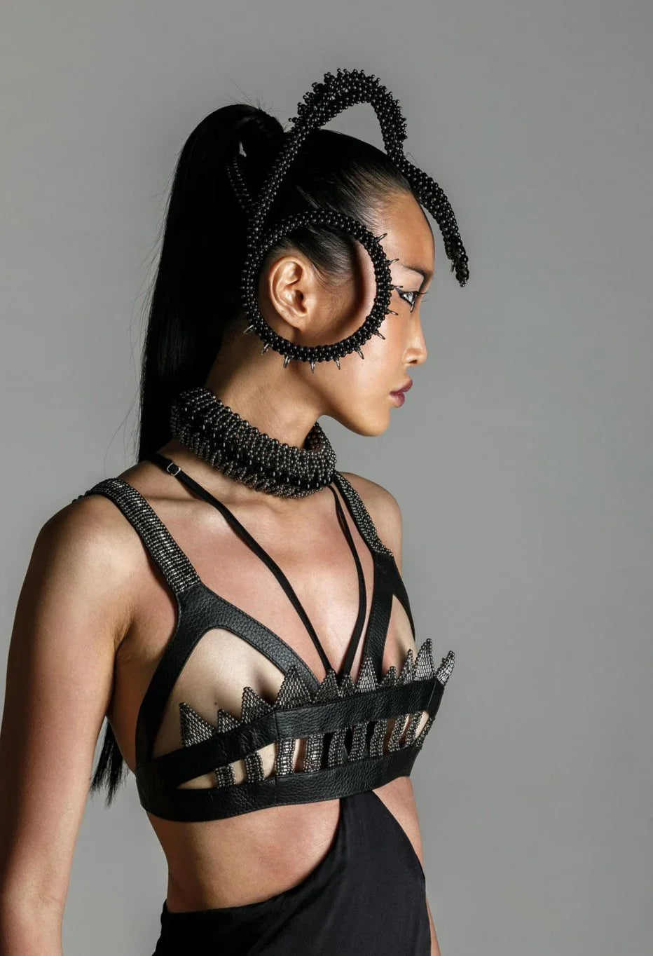 woman in black outfit wear lister beaded leather bra top jet black by object and dawn