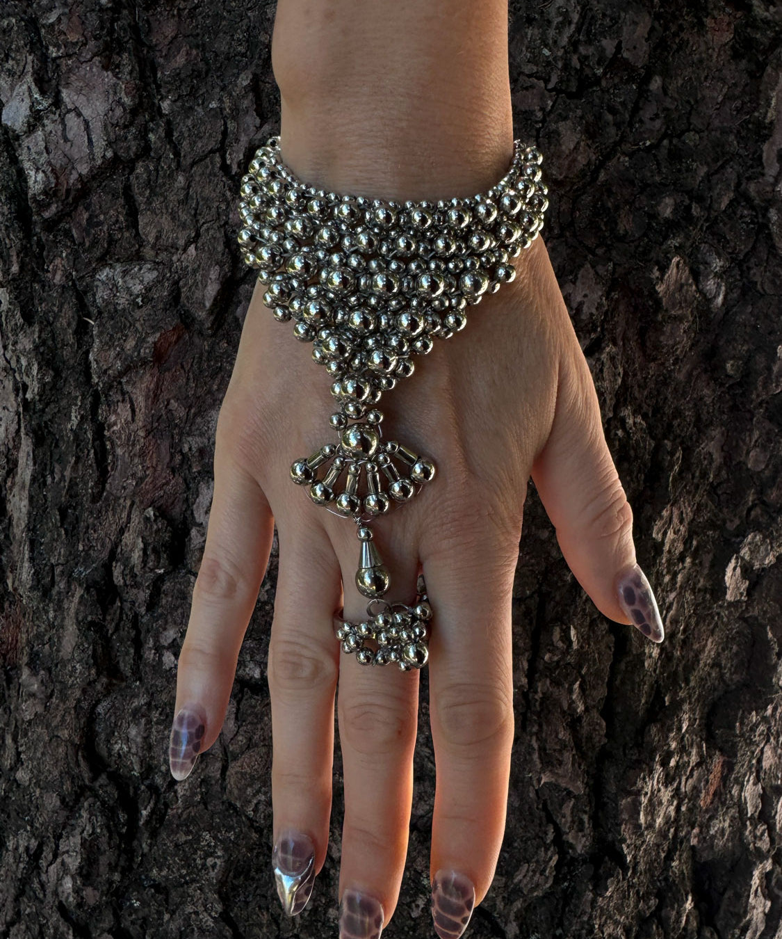 MATA-HARI-HAND-ring-JEWELRY-by-OBJECT-_-DAWN--silver--a-front.jpg