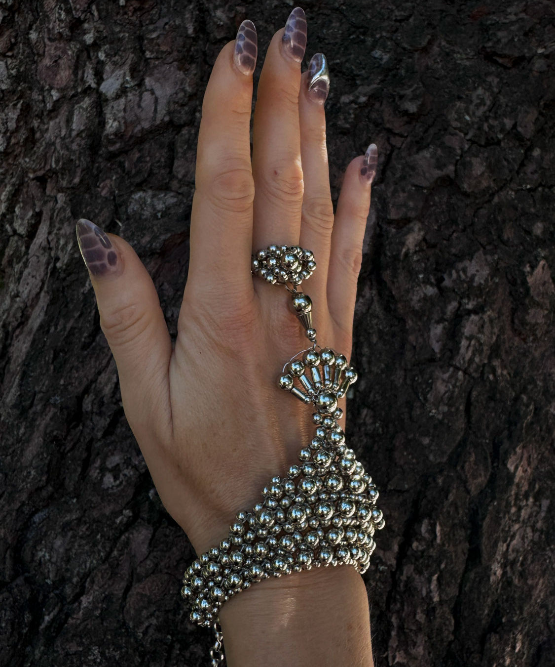 MATA-HARI-HAND-ring-JEWELRY-by-OBJECT-_-DAWN--silver--side-view.jpg