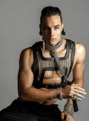 mens on grey background pose on sit position with modular beaded t-choker and yusuke beaded harness by object and dawn
