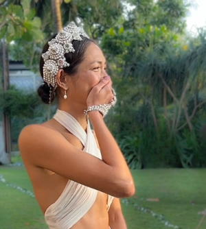 Bride Monika wearing Eingana Crown and Mata Hari bracelet in pearl by Object & Dawn on her wedding day.