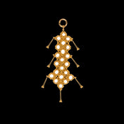Beaded cluster of modular crown in gold by object and dawn ghost image, front view