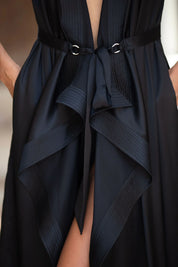Close up of center belt for a black silk sleeveless robe