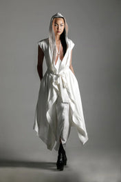 woman with luxury silk top stiched hooded cap and tamoe silk harness skirt in white by object and dawn