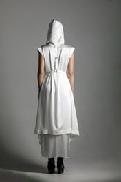 back view of woman with luxury silk top stiched hooded cap in white by object and dawn
