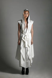 woman with luxury silk top stiched hooded cap and tamoe harness skirt in white by object and dawn