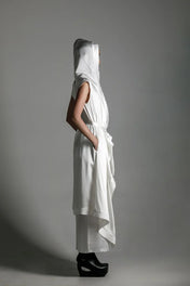 side view of woman with luxury silk top stiched hooded cap in white by object and dawn