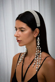 woman wear Teuta Headband pearl with trinity medallions in neutral background by object & dawn