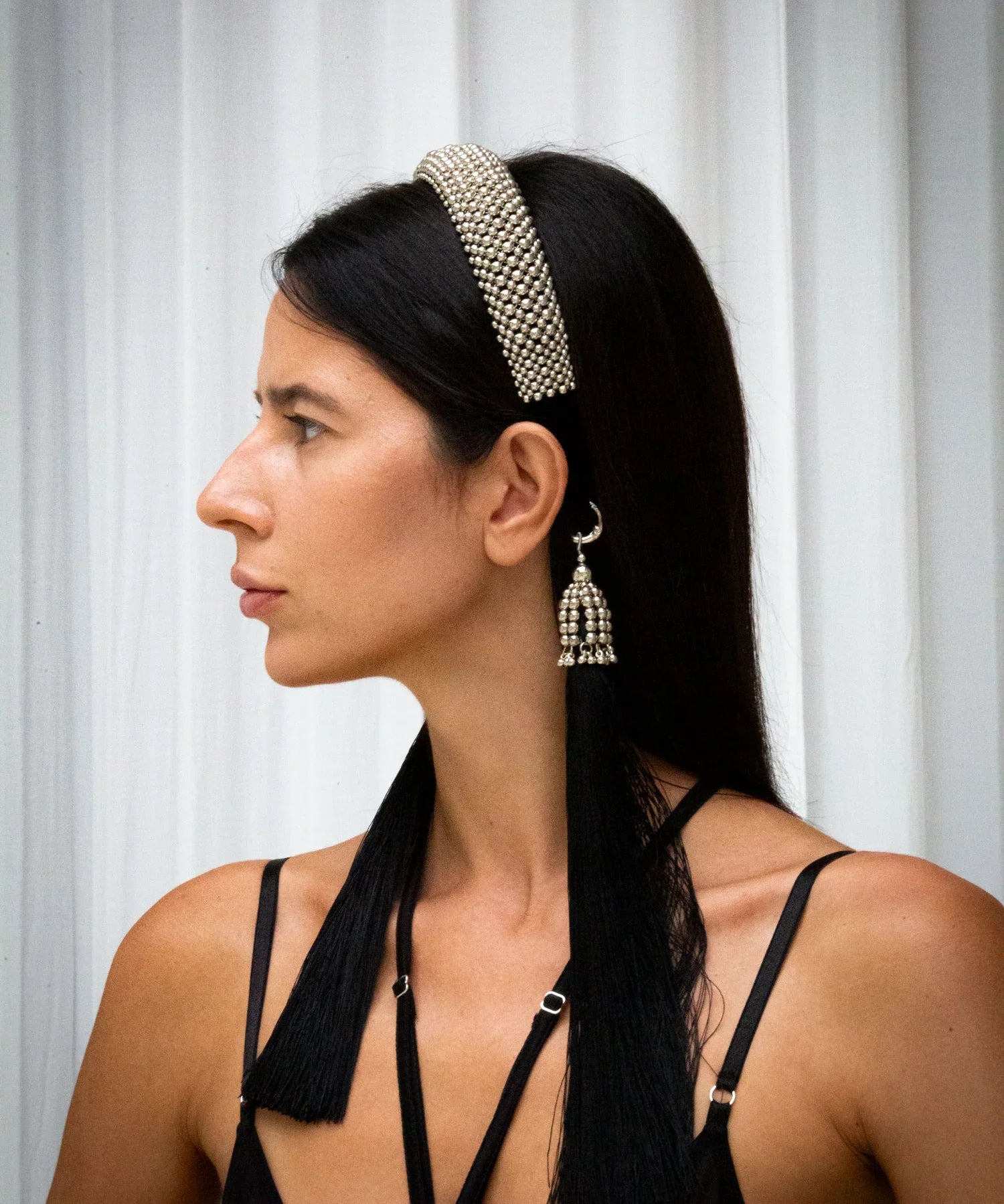 Object & Dawn Teuta Headband silver side view worn by woman in neutral background