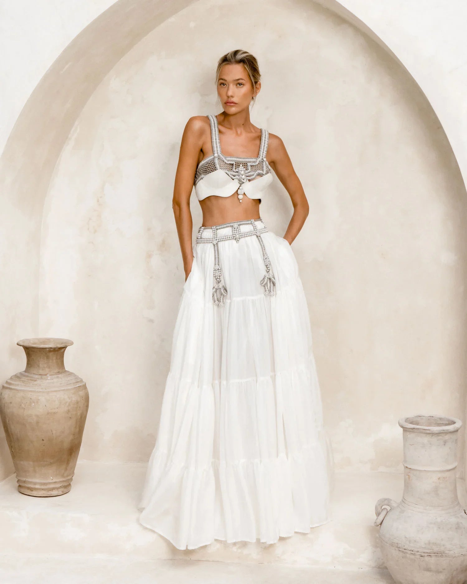 woman in white long skirt with modern bridal outfit